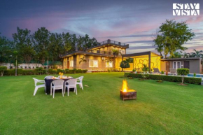 StayVista at Bloom Haven - Pet Freindly Villa with Private Outdoor Pool & Lawn